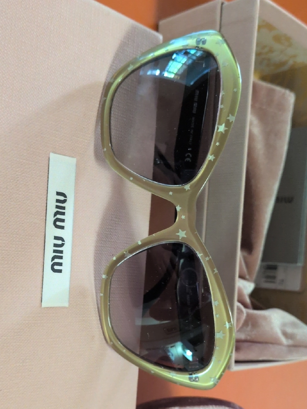 Miu Miu Olive Green Star-Embellished Cat-Eye Sunglasses